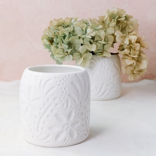 floral carved vases
